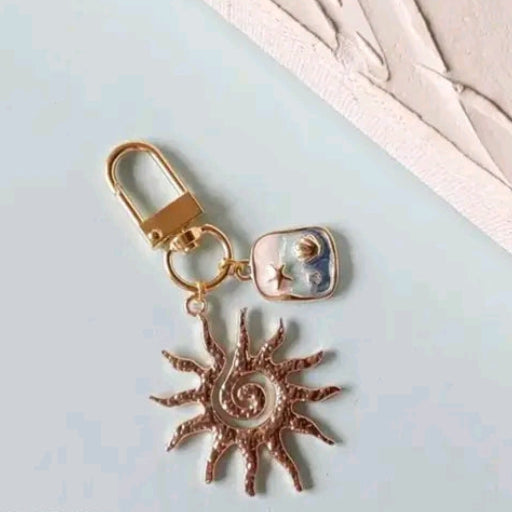 Golden Sun Bagcharms & Pearls Wristlet